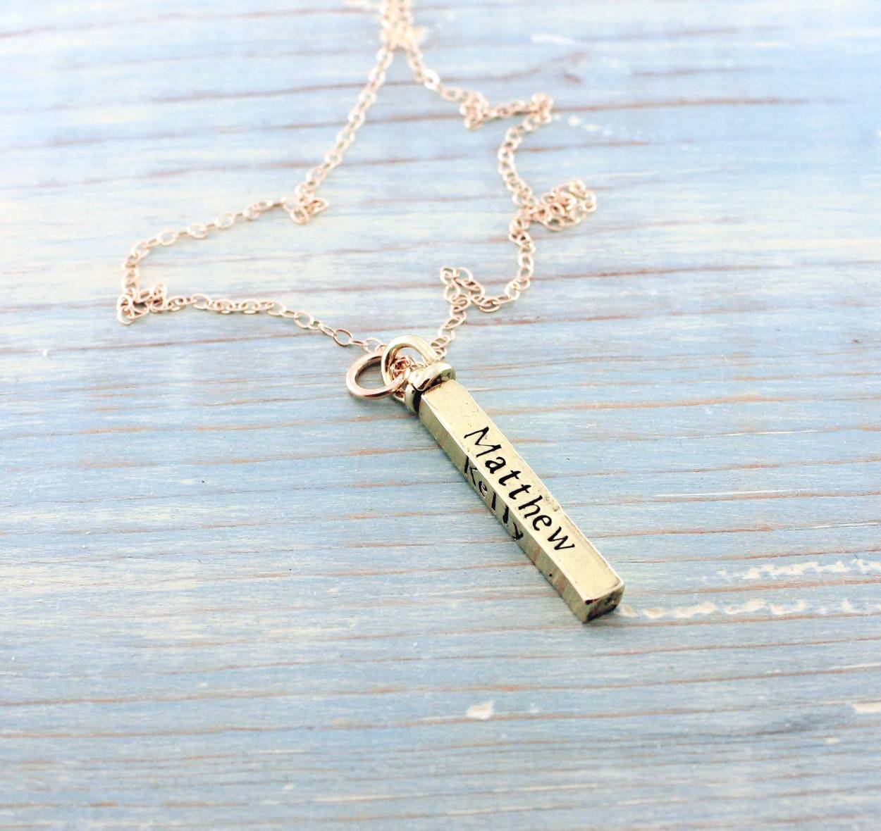 Gold swivel bar necklace