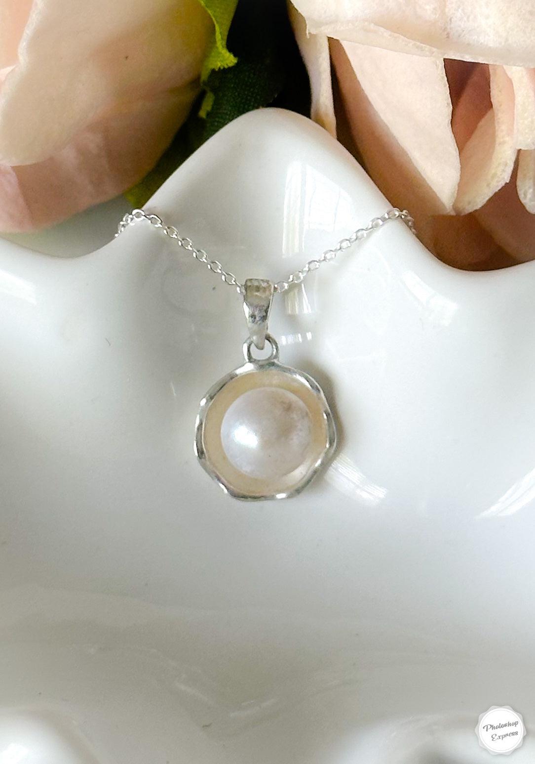 Sterling silver pearl in flower necklace