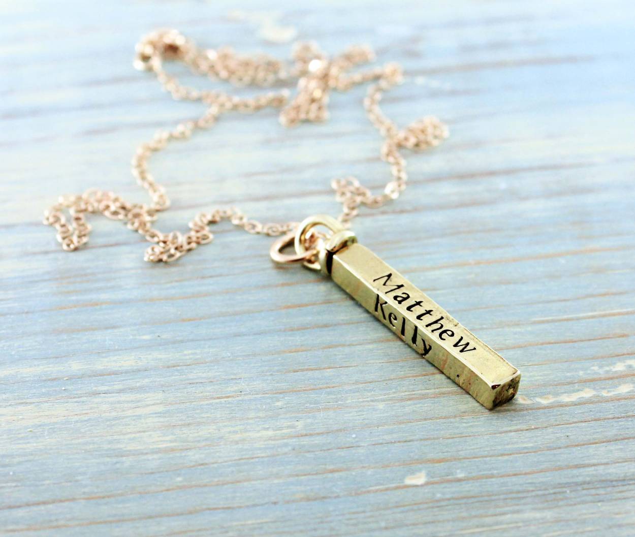 Gold swivel bar necklace