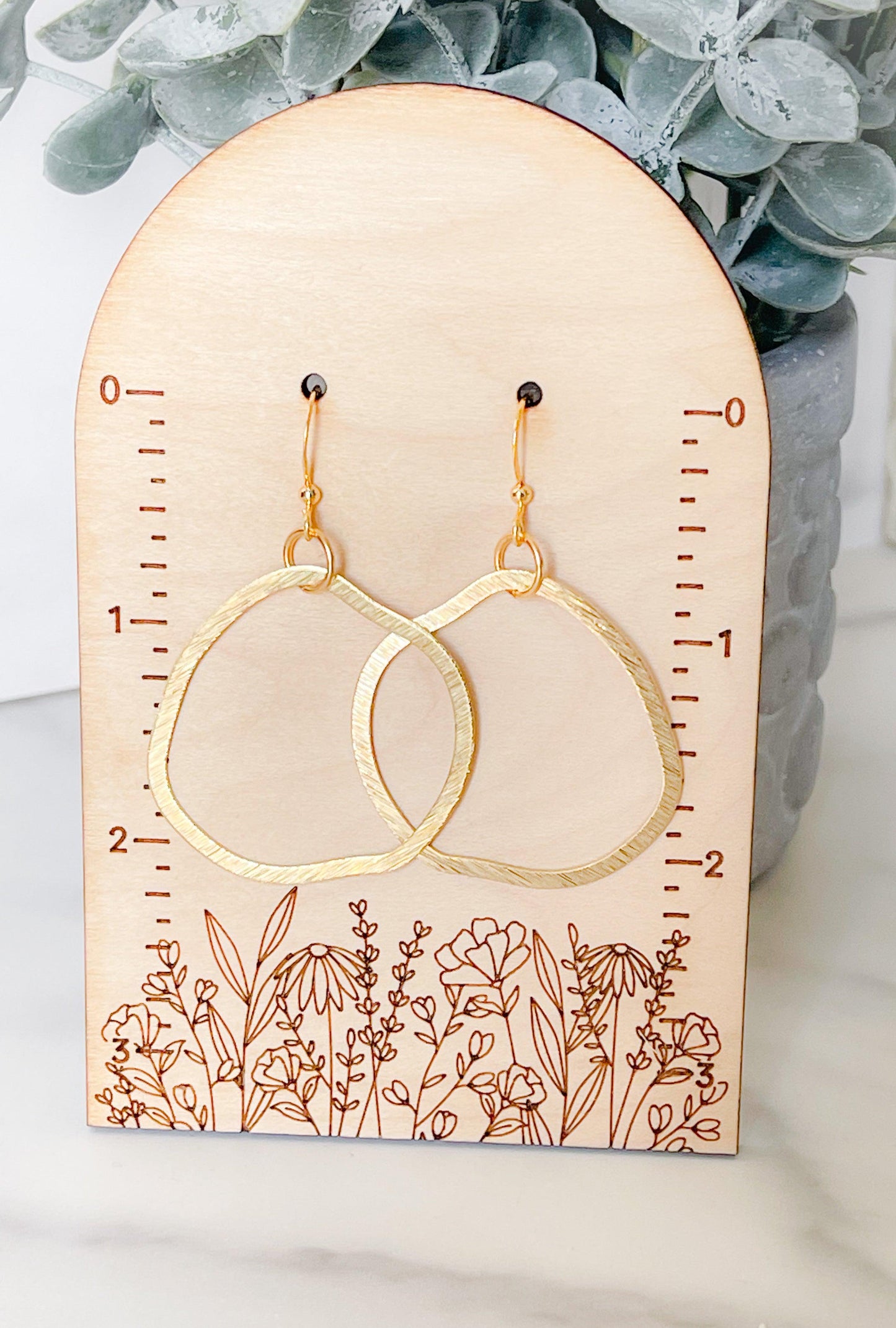 Modern gold hoop earrings