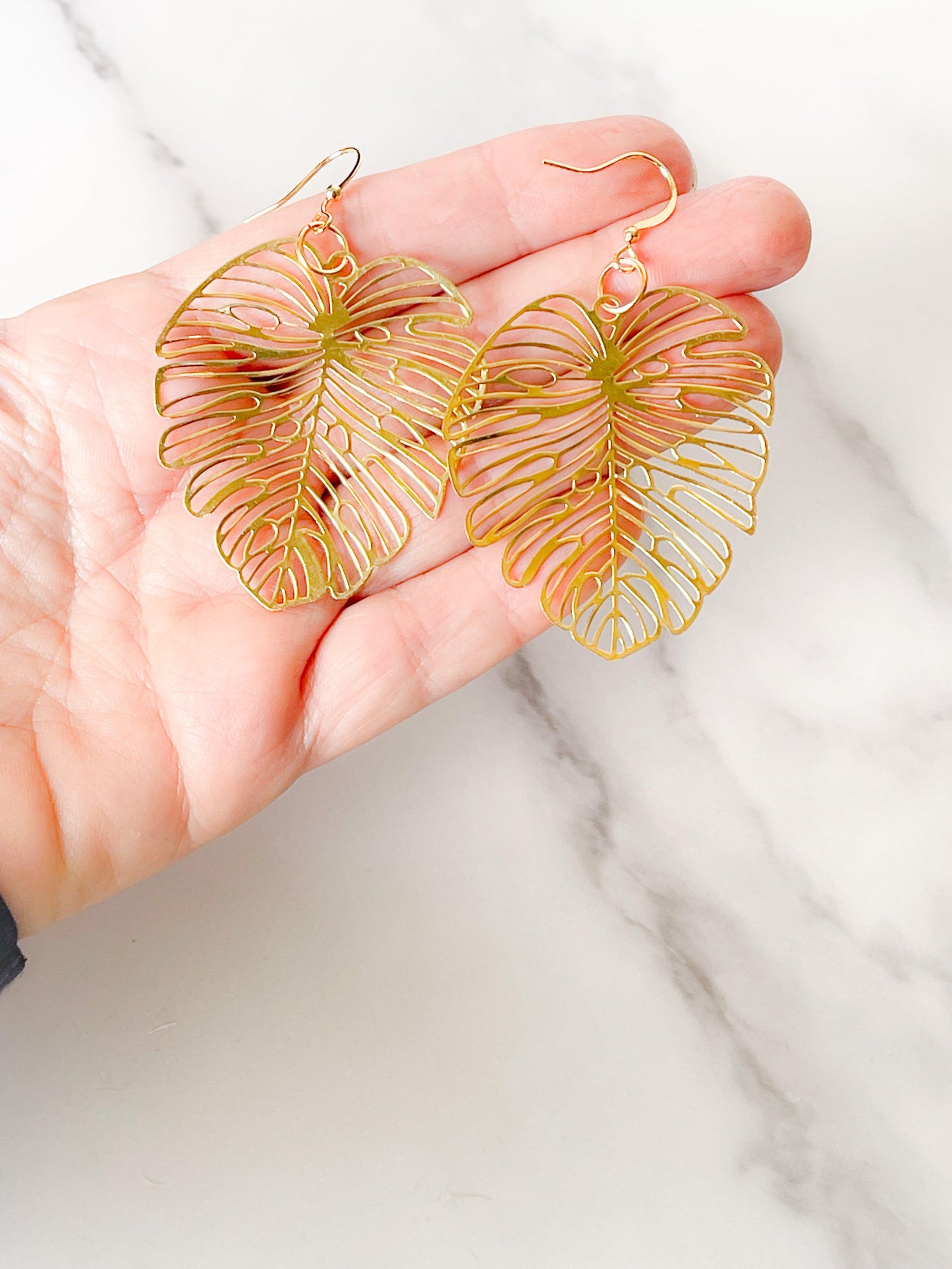 Gold statement leaf earrings