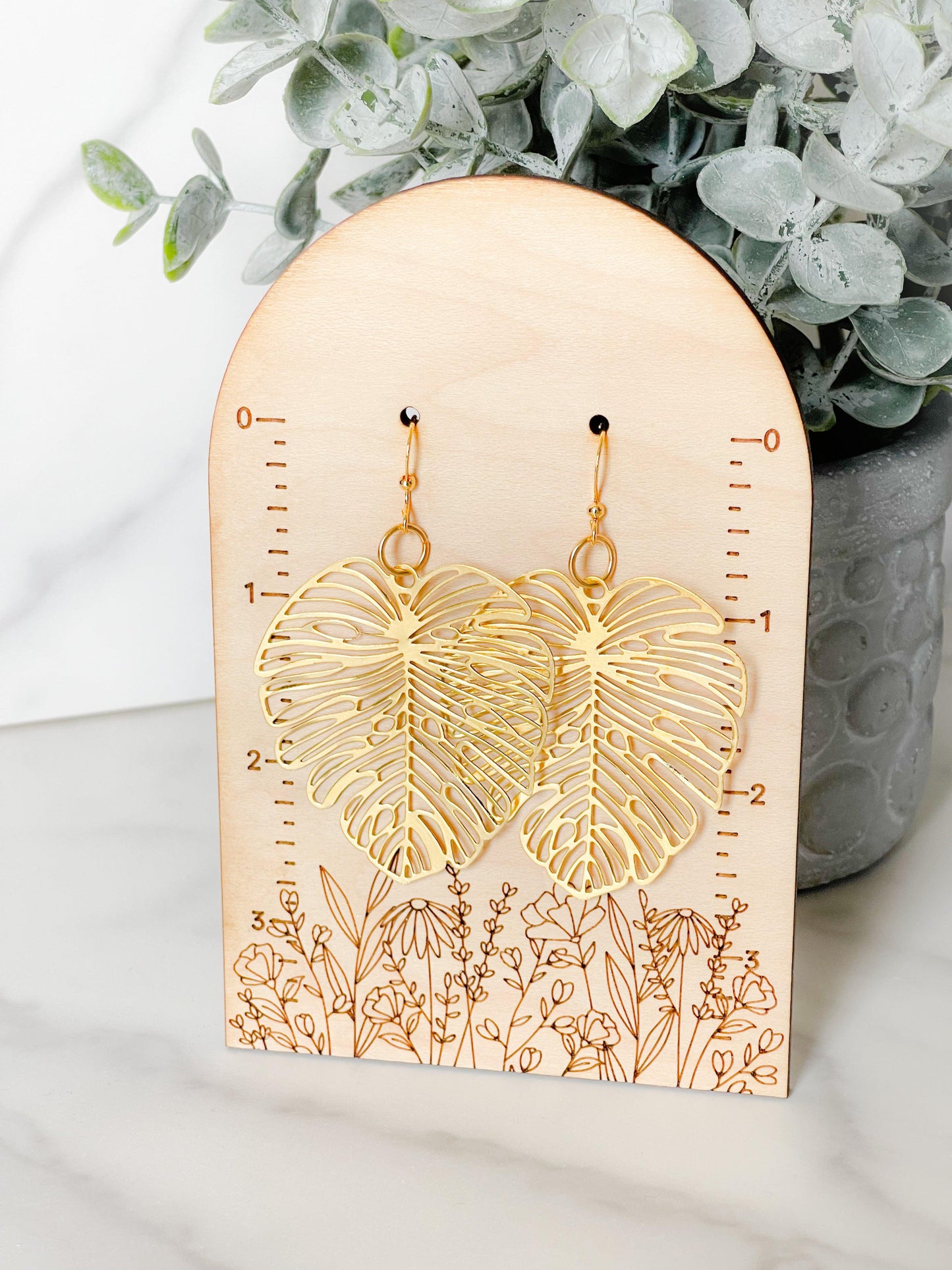 Gold statement leaf earrings