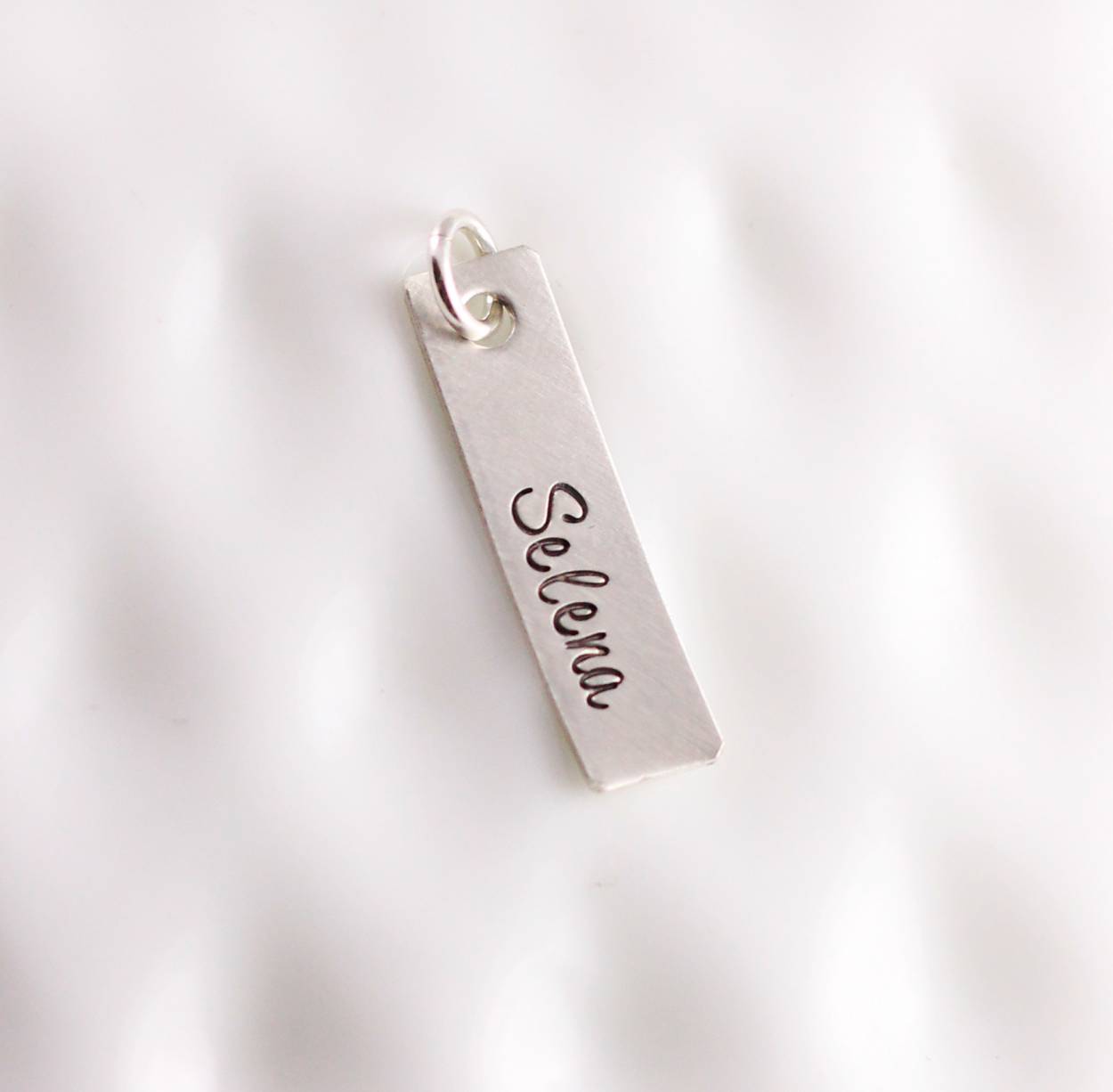 Single sterling silver name charm