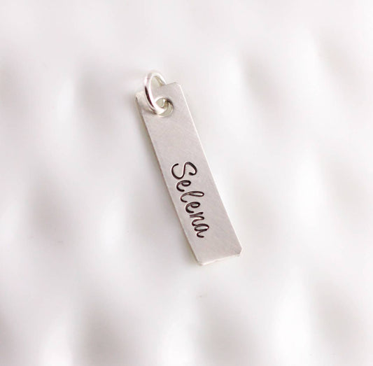 Single sterling silver name charm
